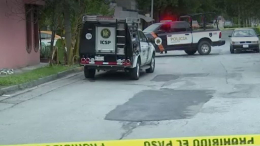 Police Vehicles with Flashing Lights on a Cordoned Street, Yellow Caution Tape in Foreground, Incident Scene. • Guadalupe Informa