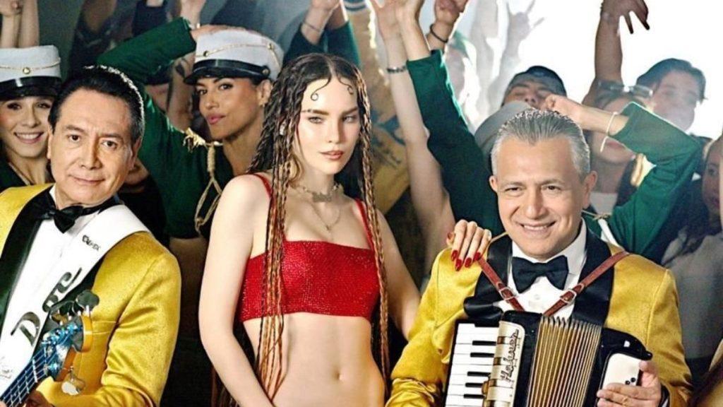 Two Musicians in Yellow Jackets (guitar and Accordion) with a Dancer in Red, While a Cheering Crowd Raises Their Hands. • Guadalupe Informa