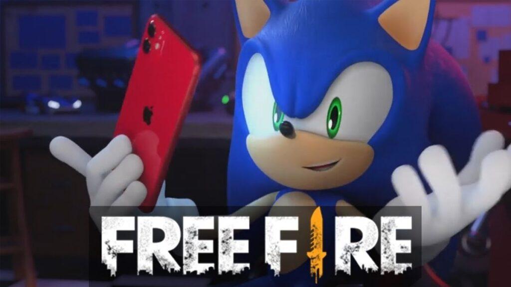 Free-fire-sonic-personaje • Guadalupe Informa Sonic the Hedgehog Holds a Red Iphone for a Selfie, with the 'free Fire' Logo at the Bottom. • Guadalupe Informa
